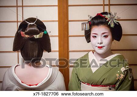 Fukuyu, geisha and Fukukimi,?maiko? geisha apprentice from Ishihatsu okiya geisha house Geisha's distric of Miyagawacho Kyoto Kansai, Japan View Large Photo Image Stock Photograph - Fukuyu, geisha and Fukukimi,?maiko? geisha apprentice from Ishihatsu okiya geisha house Geisha's distric of Miyagawacho Kyoto Kansai, Japan. Fotosearch
