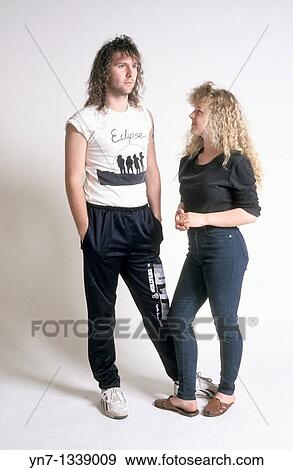 full length studio image of young couple chatting View Large Photo Image Stock Photo - full length studio image of young couple chatting. Fotosearch