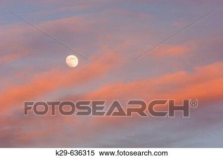 Full moon and evening clouds View Large Photo Image Stock Photography - Full moon and evening clouds. Fotosearch