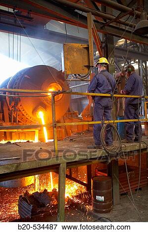 Fundiciones Urbina, Fabricacion de piezas de hierro en fundicion gris con grafito esferoidal y laminar, Legutiano, Araba, Euskadi / Foundry, manufacturing iron parts. Basque Country, Spain View Large Photo Image Stock Photo - Fundiciones Urbina, Fabricacion de piezas de hierro en fundicion gris con grafito esferoidal y laminar, Legutiano, Araba, Euskadi / Foundry, manufacturing iron parts. Basque Country, Spain. Fotosearch