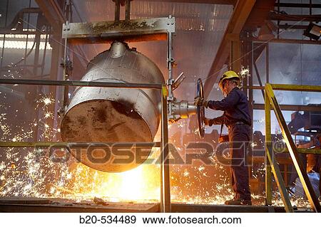 Stock Photo - Fundiciones Urbina, Fabricacion de piezas de hierro en fundicion gris con grafito esferoidal y laminar, Legutiano, Araba, Euskadi / Foundry, manufacturing iron parts. Basque Country, Spain. Fotosearch