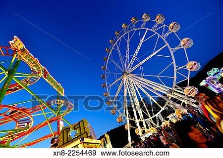 Funfair in Bilbao, Biscay, Basque Country, Euskadi, Spain, Europe. View Large Photo Image Stock Photo - Funfair in Bilbao, Biscay, Basque Country, Euskadi, Spain, Europe.. Fotosearch