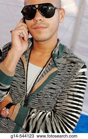 Funkshion, fashion show, Hispanic male, cell phone, sunglasses. Fashion Week. Ocean Drive. Miami Beach. Florida. USA. View Large Photo Image Stock Image - Funkshion, fashion show, Hispanic male, cell phone, sunglasses. Fashion Week. Ocean Drive. Miami Beach. Florida. USA.. Fotosearch