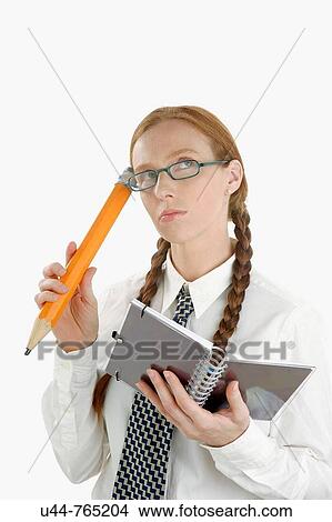 Funny secretary with a notebook and big pencil View Large Photo Image Picture - Funny secretary with a notebook and big pencil. Fotosearch
