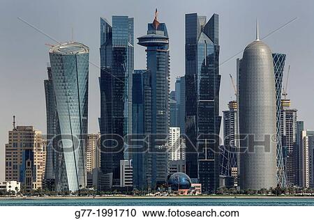 Futuristic skyscrapers in Doha skyline, Qatar View Large Photo Image Stock Image - Futuristic skyscrapers in Doha skyline, Qatar. Fotosearch