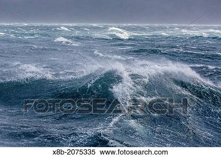 Gale force seas in Dusky Sound, Fiordland National Park, South Island, New Zealand. View Large Photo Image Stock Photography - Gale force seas in Dusky Sound, Fiordland National Park, South Island, New Zealand.. Fotosearch