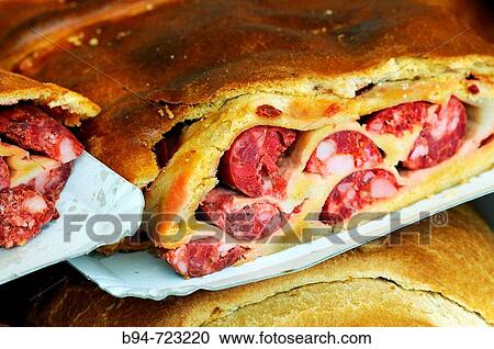 Galician??empanada?? with pork sausages at Feria de Abril (April fair), Barcelona. Catalonia, Spain View Large Photo Image Stock Image - Galician??empanada?? with pork sausages at Feria de Abril (April fair), Barcelona. Catalonia, Spain. Fotosearch