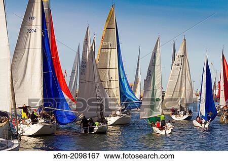 Stock Photo - Gallo boat race. Mouth of Nervion river. Portugalete, Biscay, Basque Country, Spain.. Fotosearch