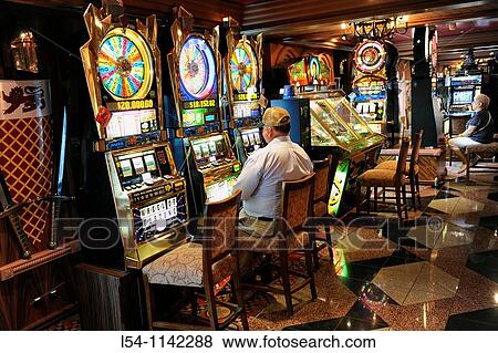 Gambling Casino Slot Machines on Caribbean Cruise Ship View Large Photo Image Stock Photo - Gambling Casino Slot Machines on Caribbean Cruise Ship. Fotosearch
