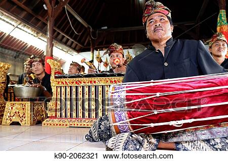 Stock Image - Gamelan - traditional balinese orchestra and musicians, Bali, Indonesia, Southeast Asia.. Fotosearch