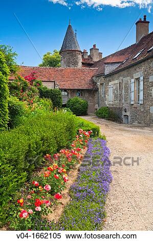 Stock Photography - Garden and buildings at the castle of Epoisses, Burgundy, France, Europe. Fotosearch
