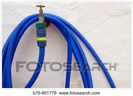 Garden hose View Large Photo Image Stock Photo - Garden hose. Fotosearch