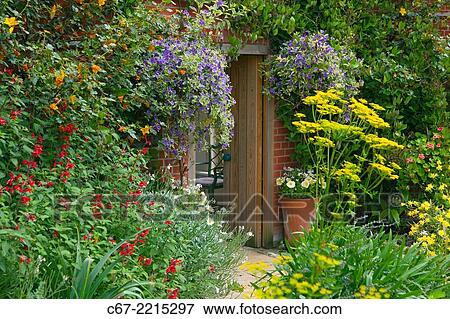 Gardenroom doorway and Herbaceous borders. View Large Photo Image Stock Photo - Gardenroom doorway and Herbaceous borders.. Fotosearch