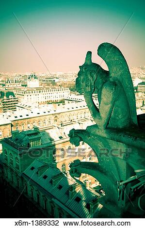 Stock Image - Gargoyle figure Notre Dame Cathedral Paris, France, Europe. Fotosearch