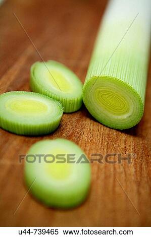 Garlic Leeks in a wood table View Large Photo Image Stock Photography - Garlic Leeks in a wood table. Fotosearch
