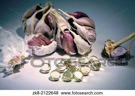 Garlic oil capsules, vitamin D pills. View Large Photo Image Stock Photo - Garlic oil capsules, vitamin D pills.. Fotosearch