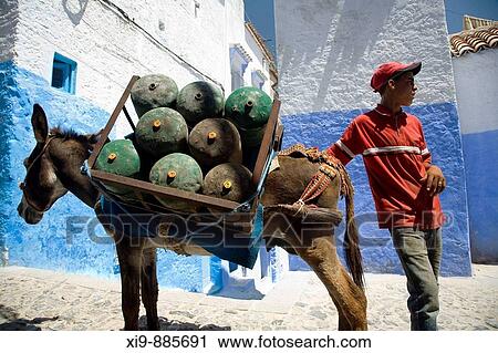 Gas delivery in the medina or old town, Chefchaouen, Morocco View Large Photo Image Stock Image - Gas delivery in the medina or old town, Chefchaouen, Morocco. Fotosearch