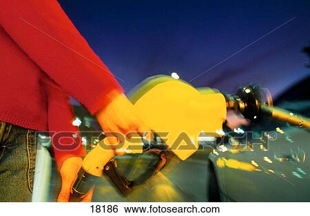 Gas pumping at twilight View Large Photo Image Stock Photograph - Gas pumping at twilight. Fotosearch
