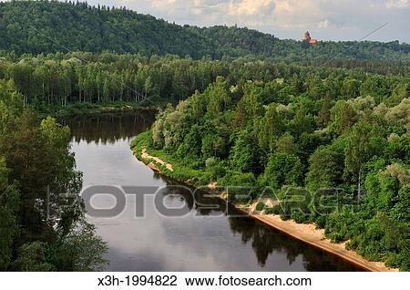 Gauja River with the Turaida Castle in background, around Sigulda, Gauja National park, Vidzeme Region, Latvia, Baltic region, Northern Europe. View Large Photo Image Stock Image - Gauja River with the Turaida Castle in background, around Sigulda, Gauja National park, Vidzeme Region, Latvia, Baltic region, Northern Europe.. Fotosearch