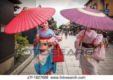 Geisha and? maiko? geisha apprentice in Hanamikoji dori street Geisha's distric of Gion Kyoto Kansai, Japan View Large Photo Image Stock Photo - Geisha and? maiko? geisha apprentice in Hanamikoji dori street Geisha's distric of Gion Kyoto Kansai, Japan. Fotosearch