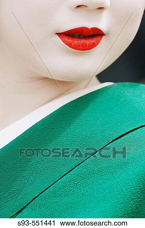 Geisha in traditional make-up and wearing a kimono in the Gion district of Kyoto, Japan. View Large Photo Image Stock Image - Geisha in traditional make-up and wearing a kimono in the Gion district of Kyoto, Japan.. Fotosearch
