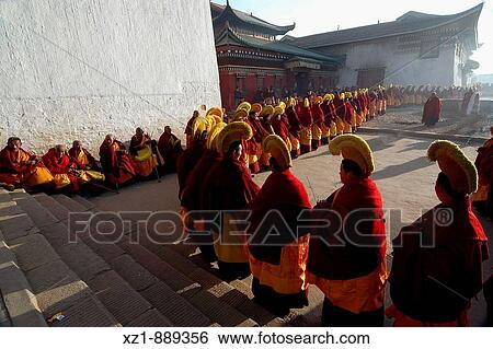 Stock Photograph - Gelug (Yellow Hat sect) ceremony, Gerdeng Tibetan Monastery in Aba, Sichuan, China. Fotosearch