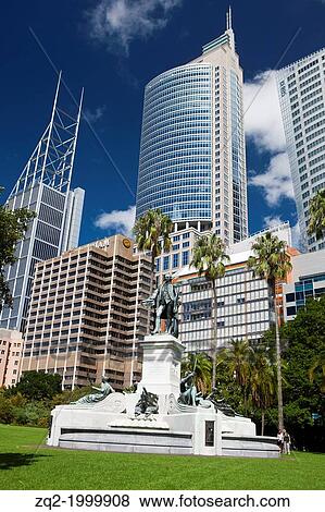 Stock Photo - General view of a statue with office buildings behind, The Royal Botanic Gardens, Sydney, Australia.. Fotosearch