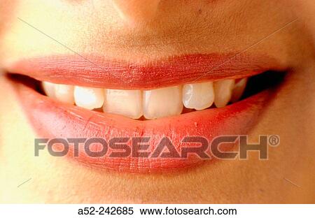 Gentle smiling lady with teeth showing View Large Photo Image Stock Photography - Gentle smiling lady with teeth showing. Fotosearch
