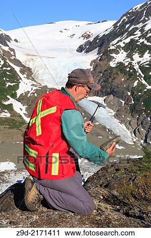 Geologist exploring for minerals, Salmon Glacier area, Stewart, British Columbia. View Large Photo Image Stock Image - Geologist exploring for minerals, Salmon Glacier area, Stewart, British Columbia.. Fotosearch