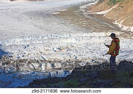 Geologist exploring for minerals, Salmon Glacier area, Stewart, British Columbia. View Large Photo Image Stock Photograph - Geologist exploring for minerals, Salmon Glacier area, Stewart, British Columbia.. Fotosearch