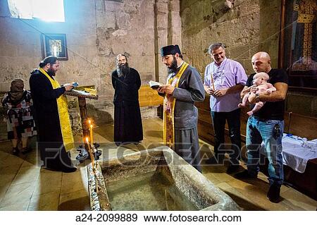Georgia, Mtskheta City (W. H. ), Sveti Tskhoveli Cathedral, Baptism ceremony. View Large Photo Image Stock Photo - Georgia, Mtskheta City (W. H. ), Sveti Tskhoveli Cathedral, Baptism ceremony.. Fotosearch
