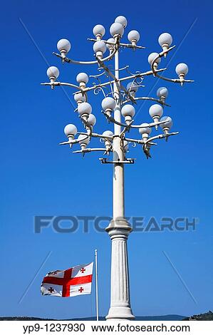Georgia - Tbilisi - Georgia flag and ornate lamp post View Large Photo Image Stock Image - Georgia - Tbilisi - Georgia flag and ornate lamp post. Fotosearch