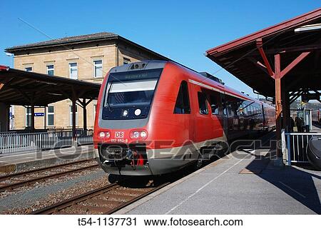 Stock Image - German Local Train at a Station.. Fotosearch