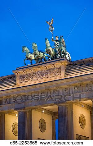 Germany, Berlin, Mitte, Brandenburger Tor, Brandenburg Gate, detail of Quadriga statue, dusk. View Large Photo Image Stock Photo - Germany, Berlin, Mitte, Brandenburger Tor, Brandenburg Gate, detail of Quadriga statue, dusk.. Fotosearch
