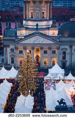 Stock Photo - Germany, Berlin, Mitte, Gendarmenmarkt, Christmas market, elevated view with Deutscher Dom, dusk.. Fotosearch