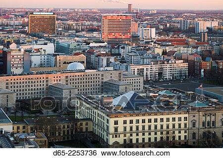 Germany, Berlin, Mitte, Panorama Punkt-Potsdamer Platz, elevated city view of Mitte government buildings, sunset. View Large Photo Image Stock Photograph - Germany, Berlin, Mitte, Panorama Punkt-Potsdamer Platz, elevated city view of Mitte government buildings, sunset.. Fotosearch