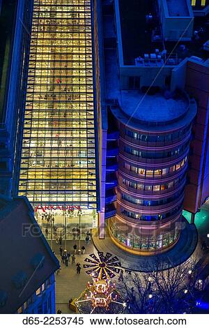 Germany, Berlin, Mitte, Panorama Punkt-Potsdamer Platz, elevated view of the Arkaden shopping mall, evening. View Large Photo Image Stock Photography - Germany, Berlin, Mitte, Panorama Punkt-Potsdamer Platz, elevated view of the Arkaden shopping mall, evening.. Fotosearch