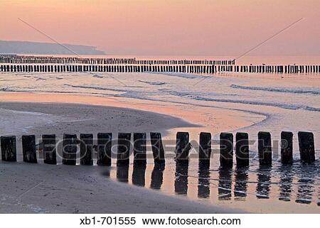 Stock Photography - Germany, Mecklenburg-Western Pomerania, Warnem? nde, the beach in wintertime. Fotosearch