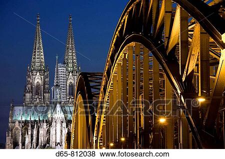 Germany, Nordrhein-Westfalen, Cologne, Cologne Cathedral and Hohenzollern Bridge, evening View Large Photo Image Stock Photo - Germany, Nordrhein-Westfalen, Cologne, Cologne Cathedral and Hohenzollern Bridge, evening. Fotosearch