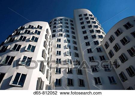 Stock Image - Germany, Nordrhein-Westfalen, Dusseldorf, Medienhafen, Frank Gehry building, Neuer Zollhof. Fotosearch