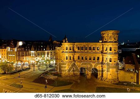 Stock Image - Germany, Rheinland-Pfaltz, Mosel River Valley, Trier, Porta Nigra, 2nd century Roman structure, evening. Fotosearch
