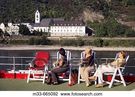 Germany - Rhineland-Palatinate - Bornhofen. Cruise down the Rhine river on board of Rhine Emerald boat. View Large Photo Image Stock Image - Germany - Rhineland-Palatinate - Bornhofen. Cruise down the Rhine river on board of Rhine Emerald boat.. Fotosearch
