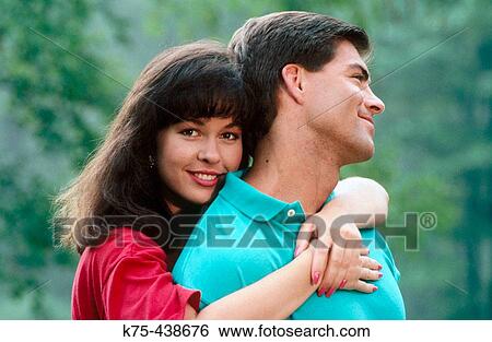 Stock Photograph - Getting a hug. Fotosearch