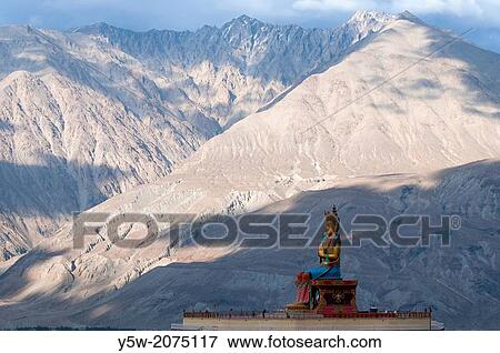 Stock Photo - Giant Maitreya Buddha statue at the Diskit Gompa in the Nubra Valley of Ladakh, northern India. Fotosearch