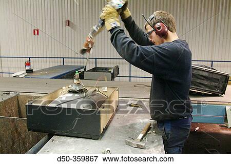 Stock Photo - Giant recycling plant, Ronnskarsverken, where metals are separated and recycled. The plant is one of Europe's few copper recycling plants where copper from electronic waste is recycled and melted into new copper. Skelleftea. Sweden.. Fotosearch
