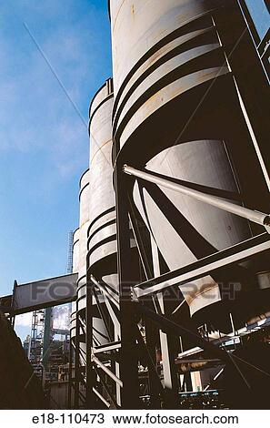 Giant steel hoppers at Harmac pulp and paper mill. Nanaimo, Biritsh Columbia, Canada View Large Photo Image Stock Image - Giant steel hoppers at Harmac pulp and paper mill. Nanaimo, Biritsh Columbia, Canada. Fotosearch