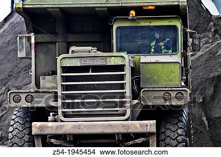Picture - Giant truck in Aviles harbor, Asturias, Spain.. Fotosearch