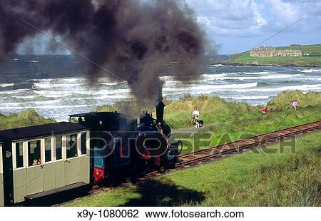 Giants Causeway and Bushmills Railway along the beach at Portballintrae between Bushmills and the Giants Causeway Ireland View Large Photo Image Stock Image - Giants Causeway and Bushmills Railway along the beach at Portballintrae between Bushmills and the Giants Causeway Ireland. Fotosearch