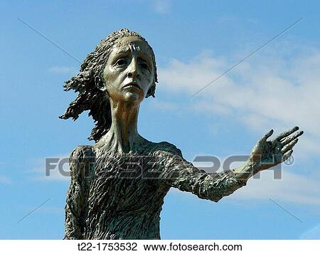 Stock Image - Gij? n Spain Monument to the Mother of Migrants on the seafront of the city of Gij? n. Fotosearch