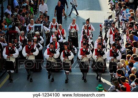 Gijon pipe band marching through the streets of Llanes, Asturias Fiestas de San Roque View Large Photo Image Stock Image - Gijon pipe band marching through the streets of Llanes, Asturias Fiestas de San Roque. Fotosearch